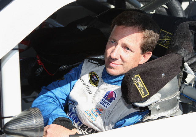 John Andretti urging others to #CheckIt4Andretti and get a colonoscopy